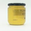 Vue latérale d un pot de miel de trèfle
